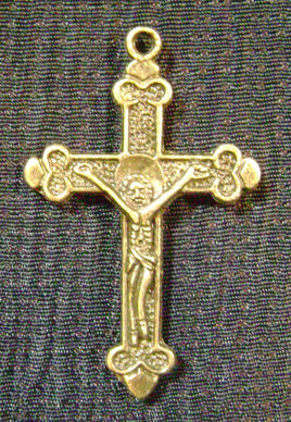 4427. Brass Crucifix Charms.