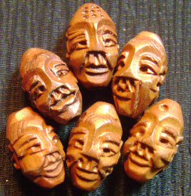 4481. Carved Wooden Head Beads.