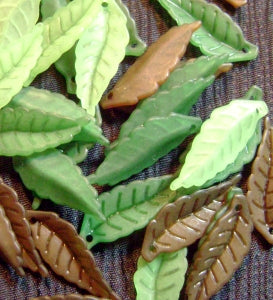 green plastic leaf charms