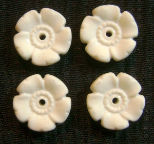 white plastic flower beads