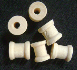 5164. Tiny Wooden Spools.